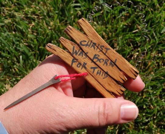 Homemade symbol of a nail as a reminder of what Christ was born for. Great for religious uses.